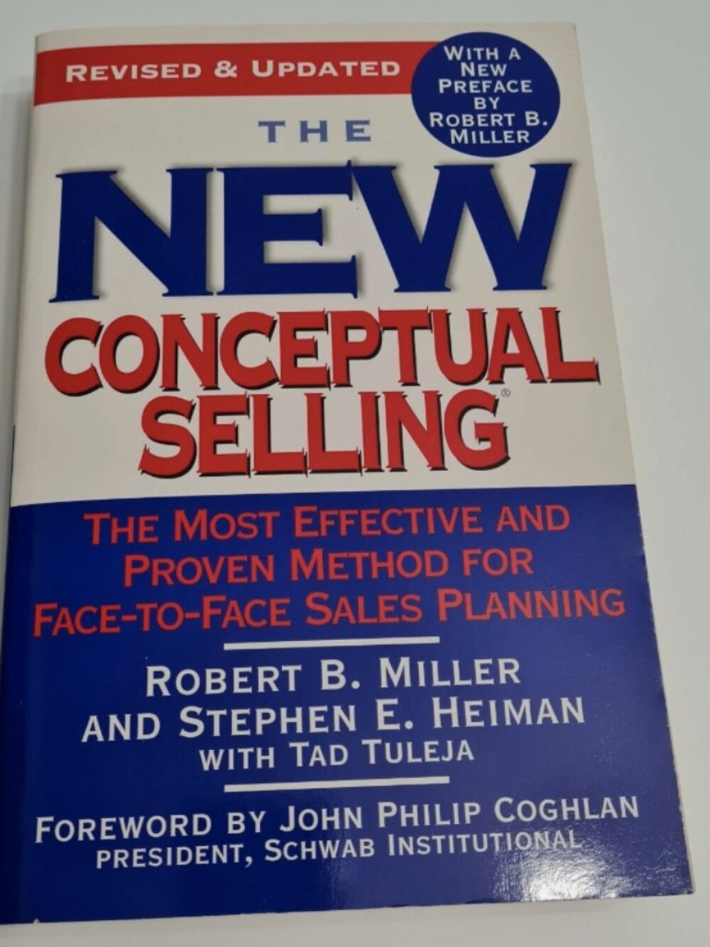 The New Conceptual Selling book by Miller & Heiman 2005 ed.